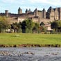 La ville de Carcassonne, en bordure de l'Aude, est connue pour sa fameuse Cité, ensemble architectural médiéval restauré par Viollet-le-Duc au XIXe siècle. et inscrit au patrimoine mondial de l'UNESCO depuis 1997. L'histoire de Carcassonne est directement