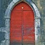 Audignon : Coquille sur la porte de l'église Sainte-Marie.
